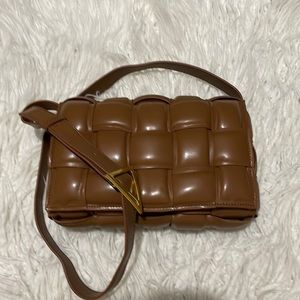 Woven leather padded cassette bag